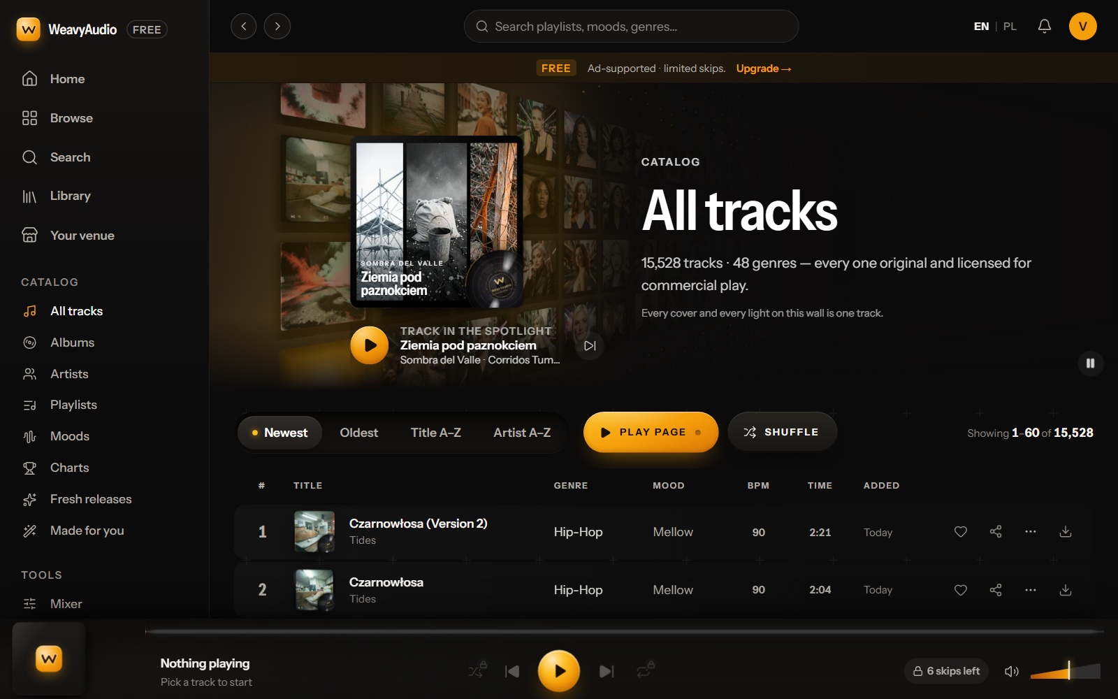 Página All tracks con 15,528 canciones, botones de orden, botones Play page y Shuffle, y el inicio de la tabla de canciones